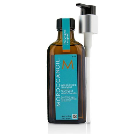 Bottle of Moroccanoil with a pump dispenser for hair treatment.